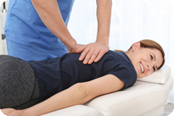 Patient receiving a chiropractic adjustment